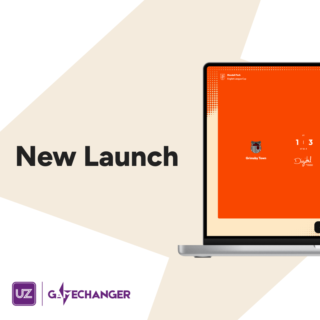 A square social post headed New Launch on a cream background with a large cream bolt shape, a laptop showing a tangerine Blackpool match centre for their away game at Grimsby Town, and the UZ Gamechanger lockup in purple at the bottom left.