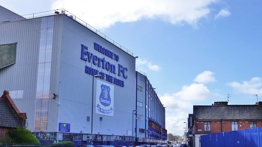 stadium exterior, flatly shot